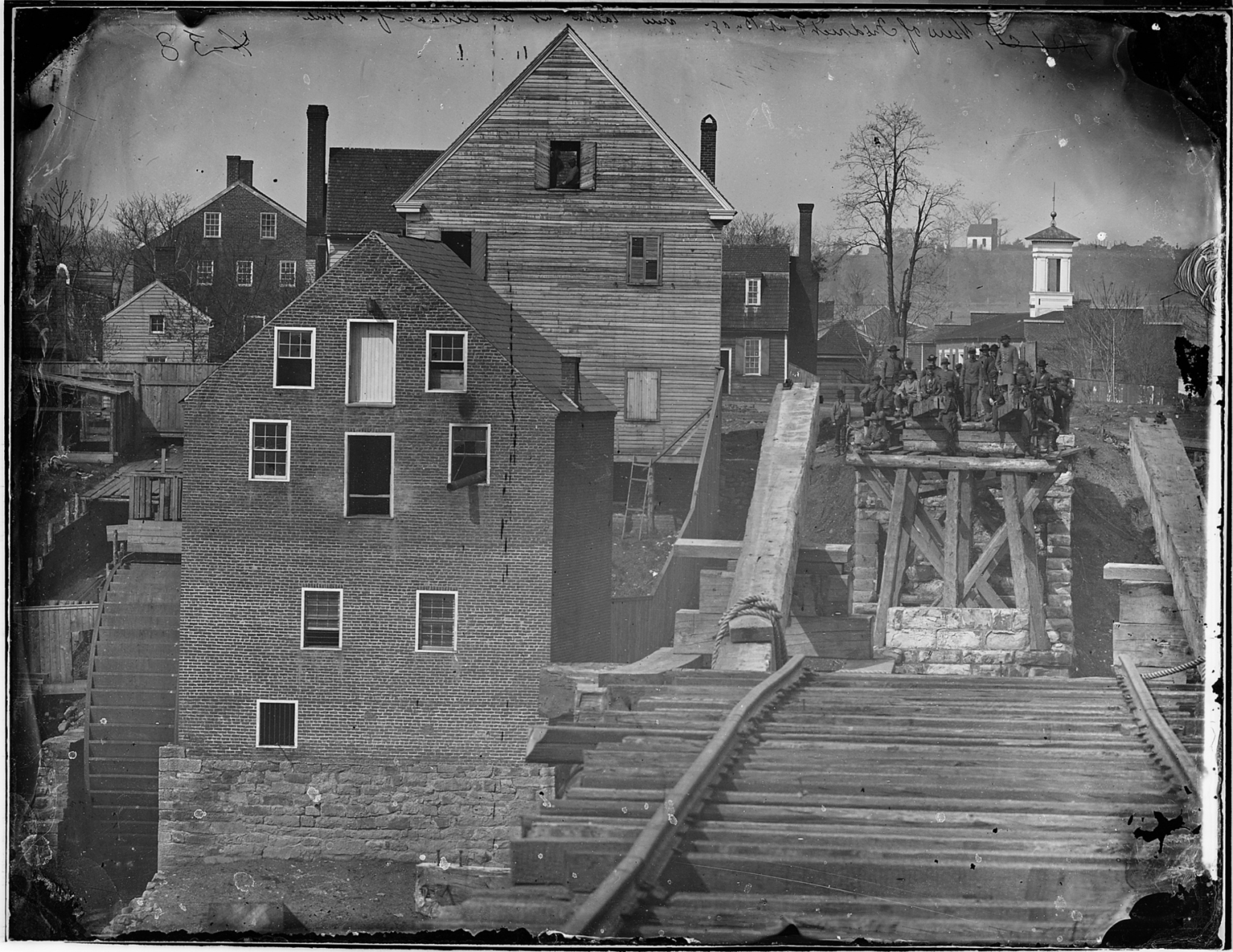 'Fredericksburg from the river. Showing Confederate troops and bridge. (taken at a distance of one mile.)' National Archives; ARC Identifier 524858 Item from Record Group 111: Records of the Office of the Chief Signal Officer, 1860 - 1985
